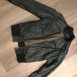 Dark green leather jacket. Made in Italy.